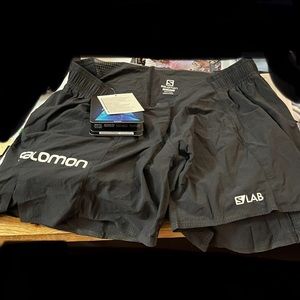 Brand new never worn Salomon woman S/LAB Shorts, black size L . I paid over $65